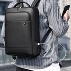 Elegant leather rucksack for men/women with USB port for laptop and everyday use, 15.6 inch, black