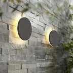 Minimalist LED wall light in round or square, IP65