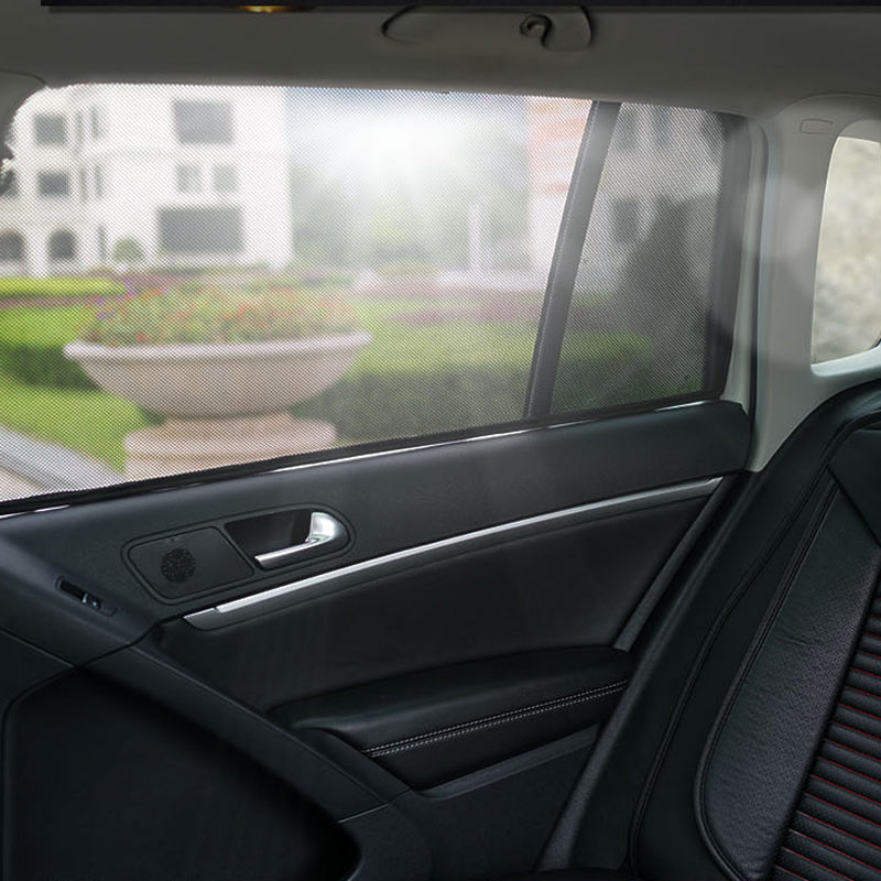 Magnetic holder for car window shade dispenser