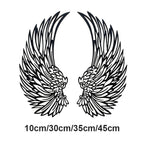 Metal wall art with angel wings and LED lights