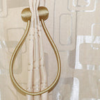 Curtain tiebacks with magnetic curtain clasp