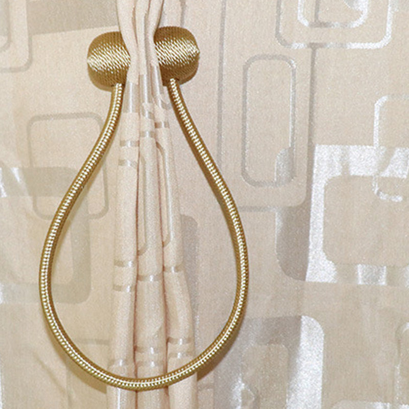 Curtain tiebacks with magnetic curtain clasp