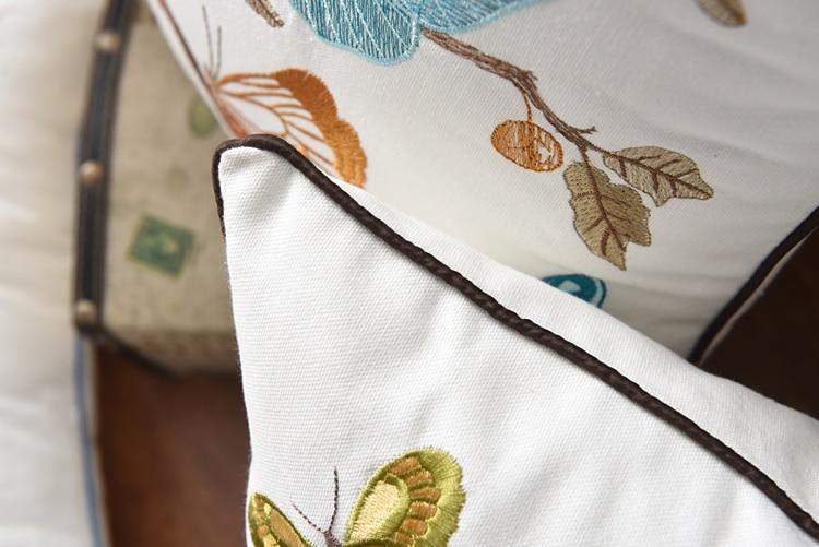 Decorative cushion with embroidery in country style