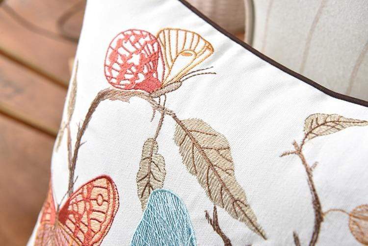 Decorative cushion with embroidery in country style