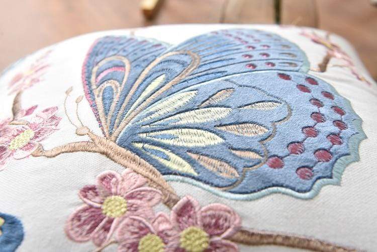 Decorative cushion with embroidery in country style