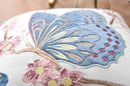 Decorative cushion with embroidery in country style