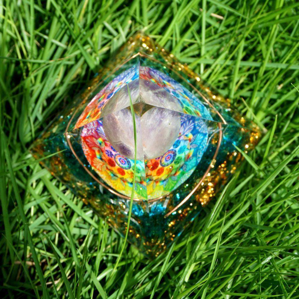Amethyst crystal ball with blue quartz orgone pyramid