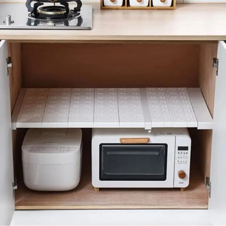 Extendable shelf board for flexible storage