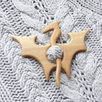 Sweet animal brooch made of wood