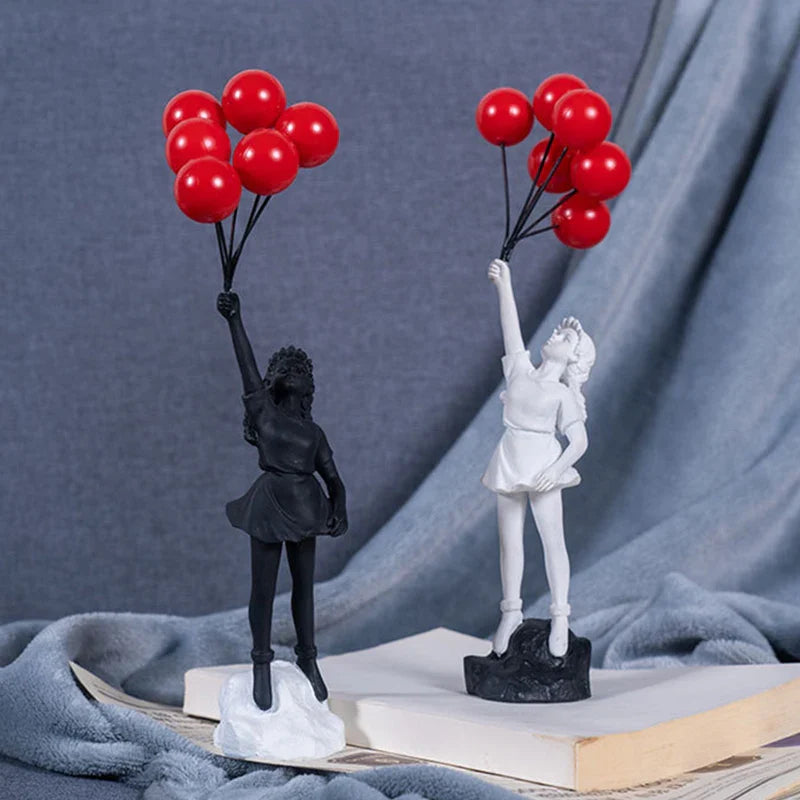 Sculpture of a girl with balloon in Banksy style for table decoration and creative living room decoration