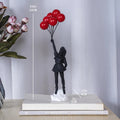 Sculpture of a girl with balloon in Banksy style for table decoration and creative living room decoration