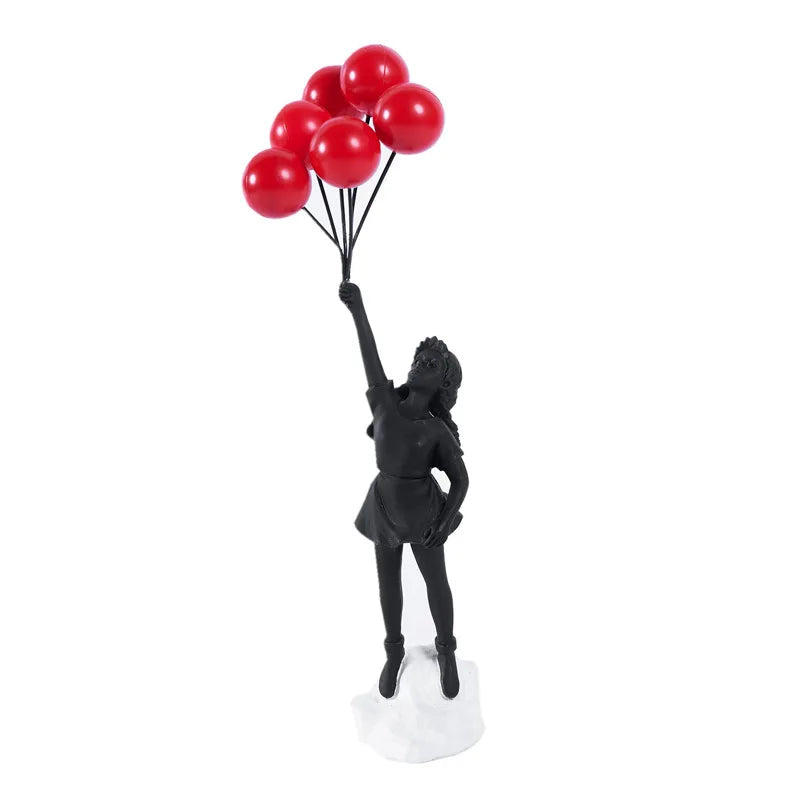 Sculpture of a girl with balloon in Banksy style for table decoration and creative living room decoration