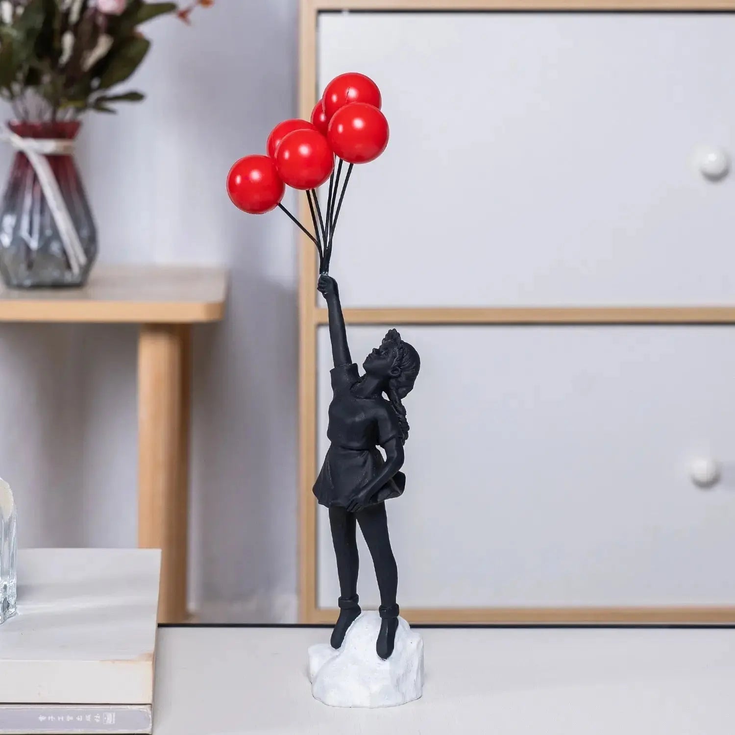 Banksy flying Balloon Girl Statue