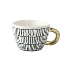 Cup with abstract geometric pattern and gold handle