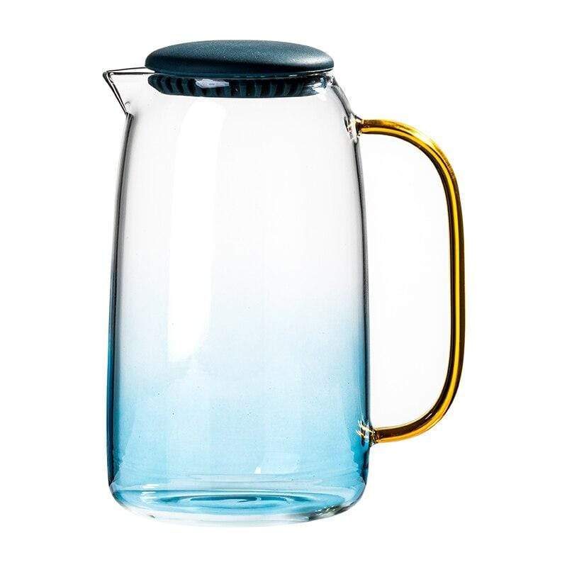 Blue glass pitcher with matching drinking glass