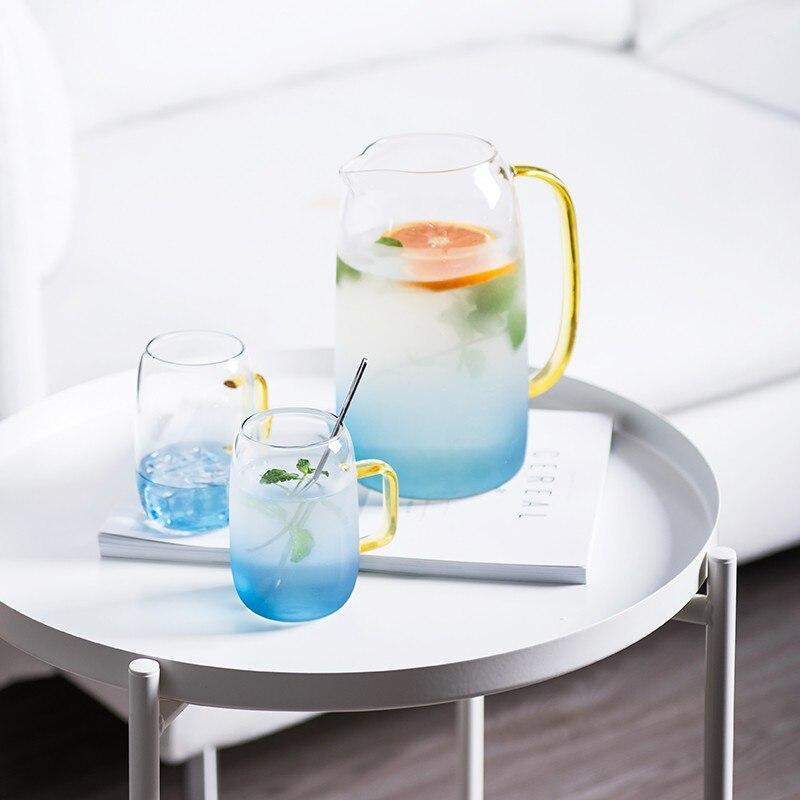 Blue glass pitcher with matching drinking glass