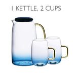 Blue glass pitcher with matching drinking glass