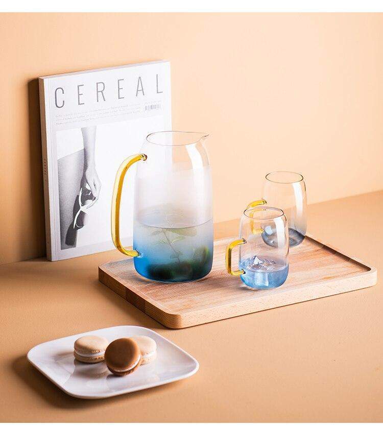 Blue glass pitcher with matching drinking glass