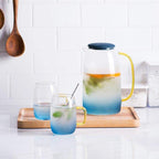 Blue glass pitcher with matching drinking glass