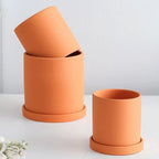 Elegant flowerpot made of ceramic with saucer