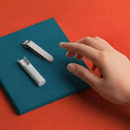 Nail Clipper with Splash Guard and Integrated File