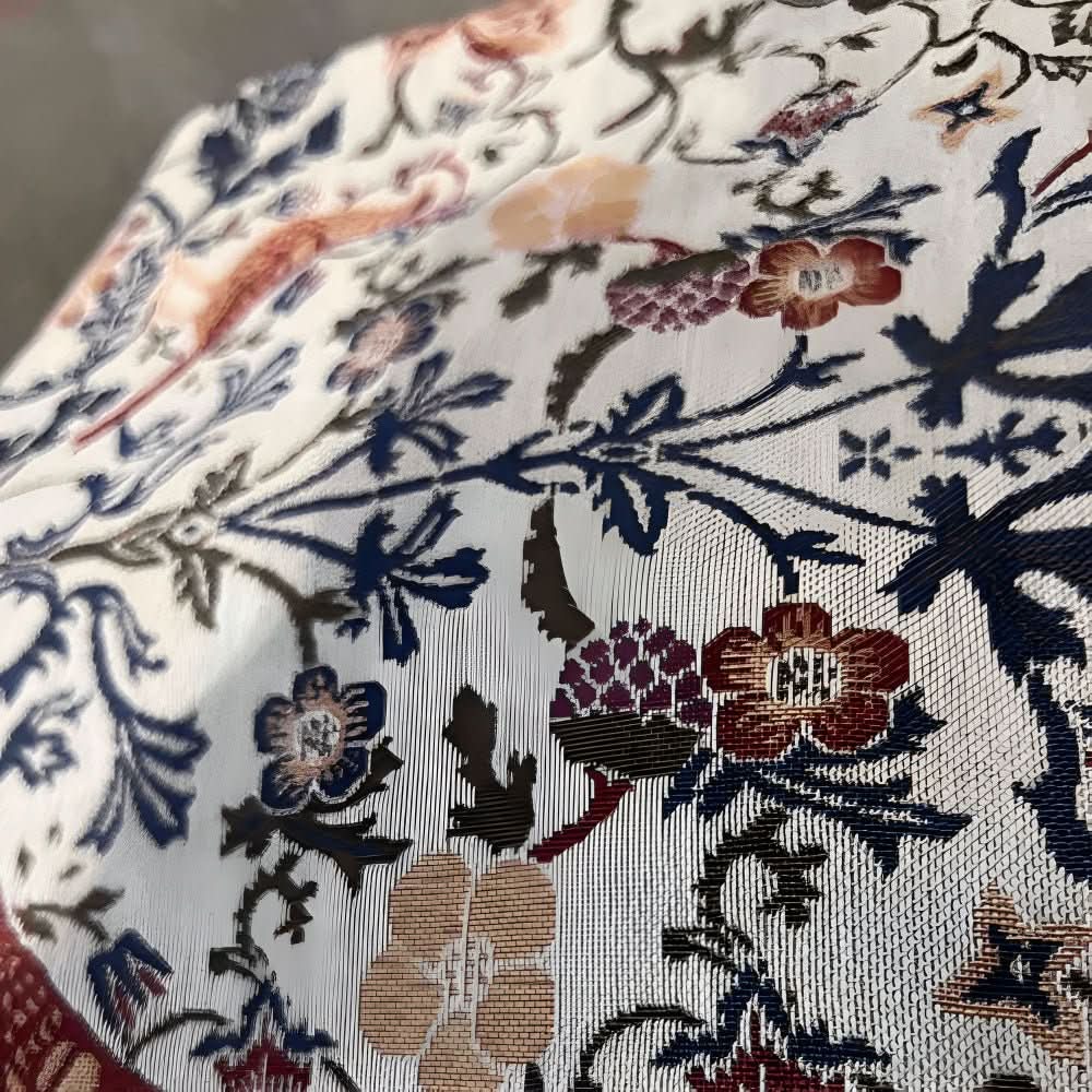 Elegant table runner with flower and bird design