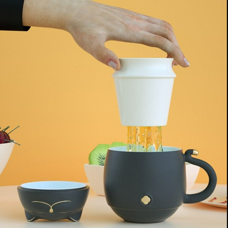 Cute cat tea cup made of ceramic with strainer