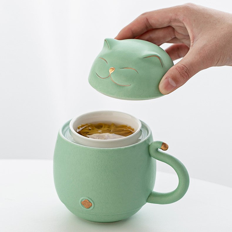 Cute cat tea cup made of ceramic with strainer
