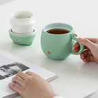 Cute cat tea cup made of ceramic with strainer