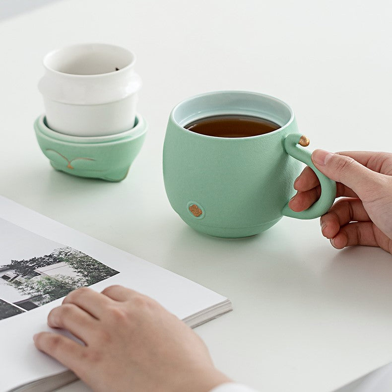Cute cat tea cup made of ceramic with strainer