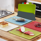 Cutting board set (4 pieces) with practical holder