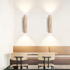 Travertine wall lamp in Japandi tube shape