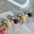 Turn-lock wall hook for tiles and glass