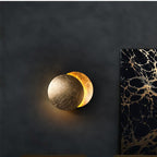 Eclipse lamp | Wall light with rotatable golden discs