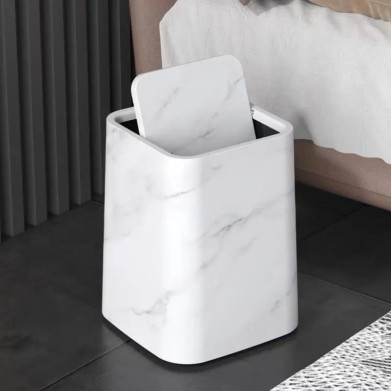 Elegant trash can in marble design with swing lid