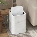 Elegant trash can in marble design with swing lid