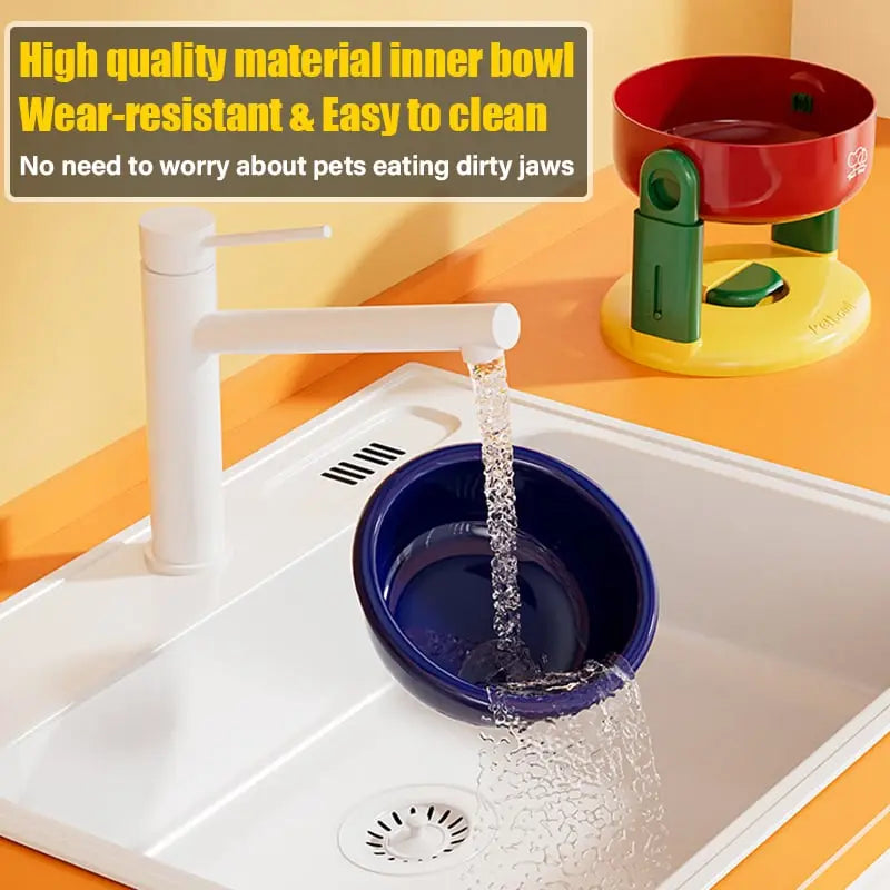 Elevated feeding bowl with tilt to prevent choking