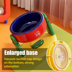 Elevated feeding bowl with tilt to prevent choking