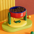 Elevated feeding bowl with tilt to prevent choking