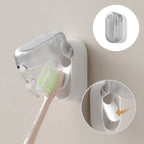 Wall-mounted toothbrush holder with cover