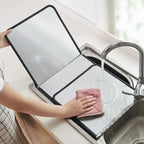 Folding splash guard with non-stick coating