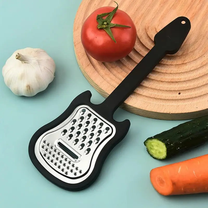 Vegetable peeler made of stainless steel – Guitar-shaped peeler for peeling & slicing