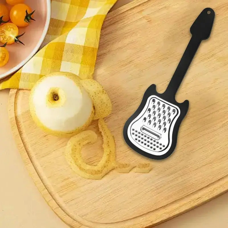 Vegetable peeler made of stainless steel – Guitar-shaped peeler for peeling & slicing
