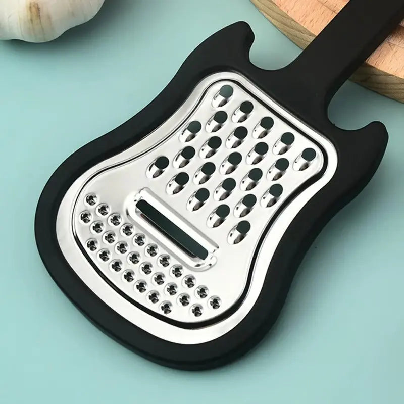 Vegetable peeler made of stainless steel – Guitar-shaped peeler for peeling & slicing