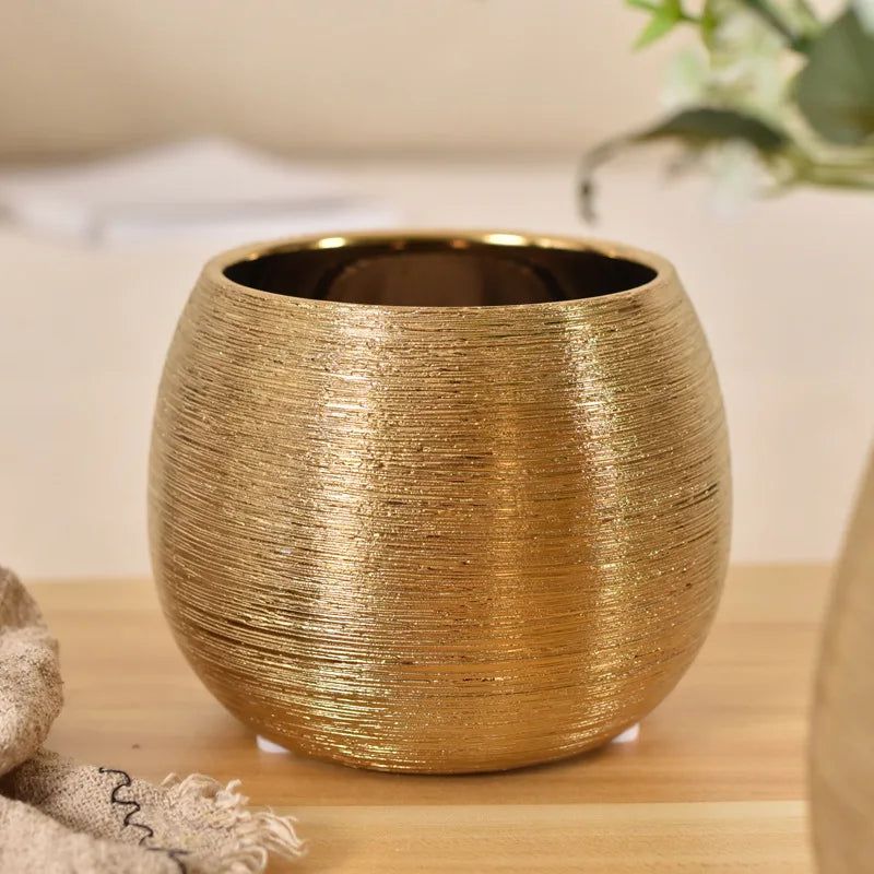 Gold-coated flower pot