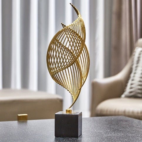 Golden abstract shell sculptures