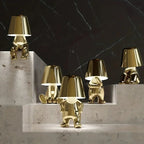 Modern LED table lamp in sculpture design – Decorative statue lamp for living room