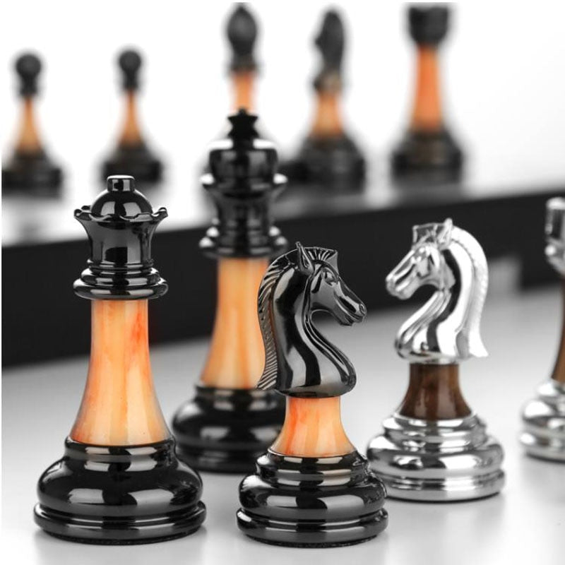 Luxurious chess set made of metal with a large 45 cm wooden board