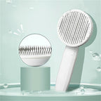Self-cleaning cat brush for less hair loss