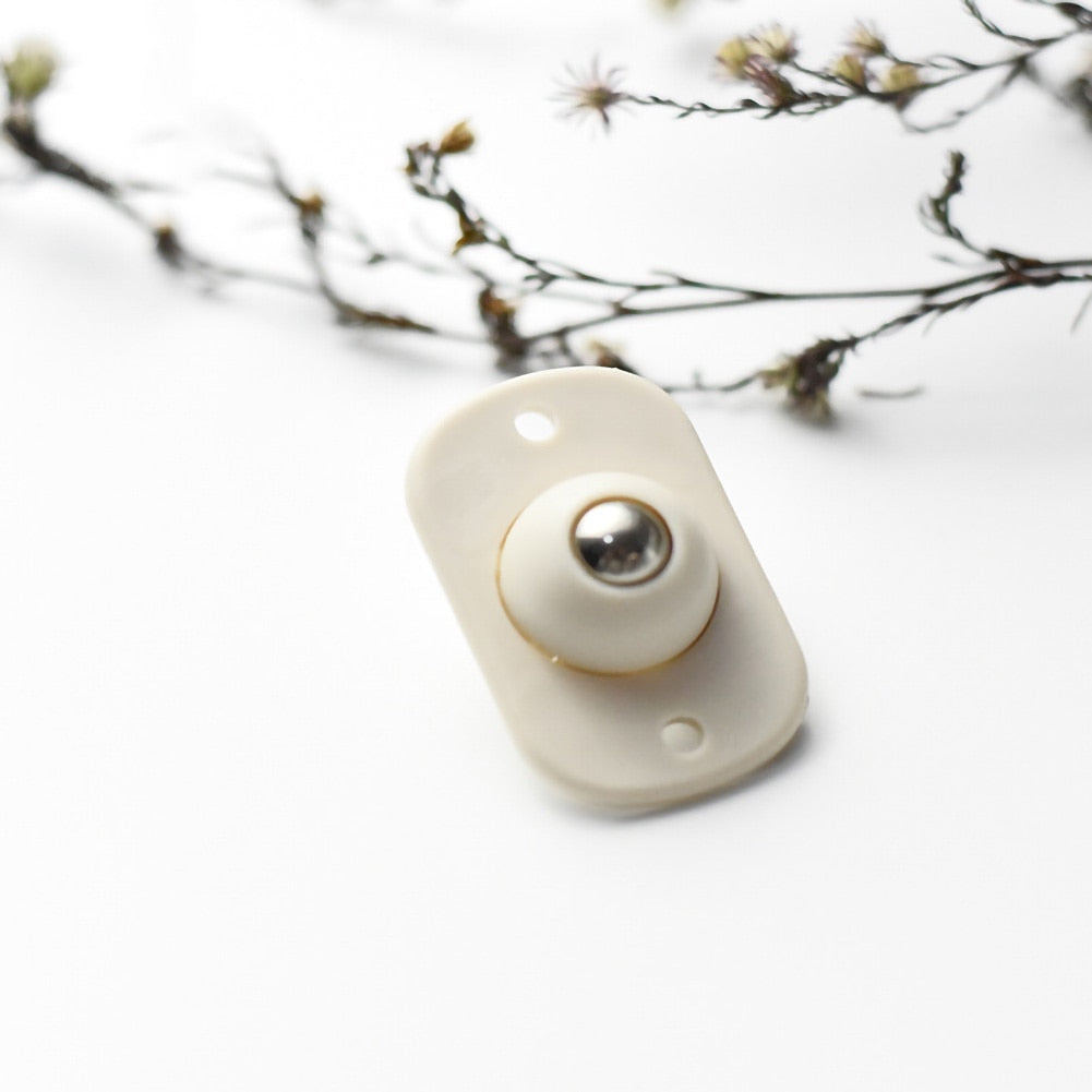 Self-adhesive small furniture wheels
